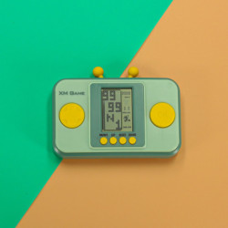 Přenosná konzole pro elektronické arkádové hry, zelená