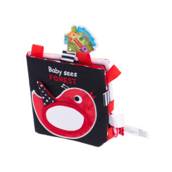 Senzorické značky na kousání knih kontrastující s lesem